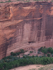 long view of Canyon De Chellys, cliff houses in distance